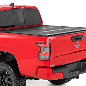 Rough Country Hard Low Profile Bed Cover 5β² Bed w/Cargo Mgmt Nissan Frontier (22-26)