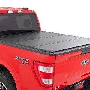 Rough Country Hard Tri-Fold Flip Up Bed Cover 6β7β³ Bed Ford F-150 2WD/4WD (2015-2020)