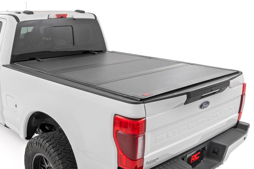 Rough Country Hard Tri-Fold Flip Up Bed Cover 6’10” Bed Ford F-250/F-350 Super Duty (17-26)
