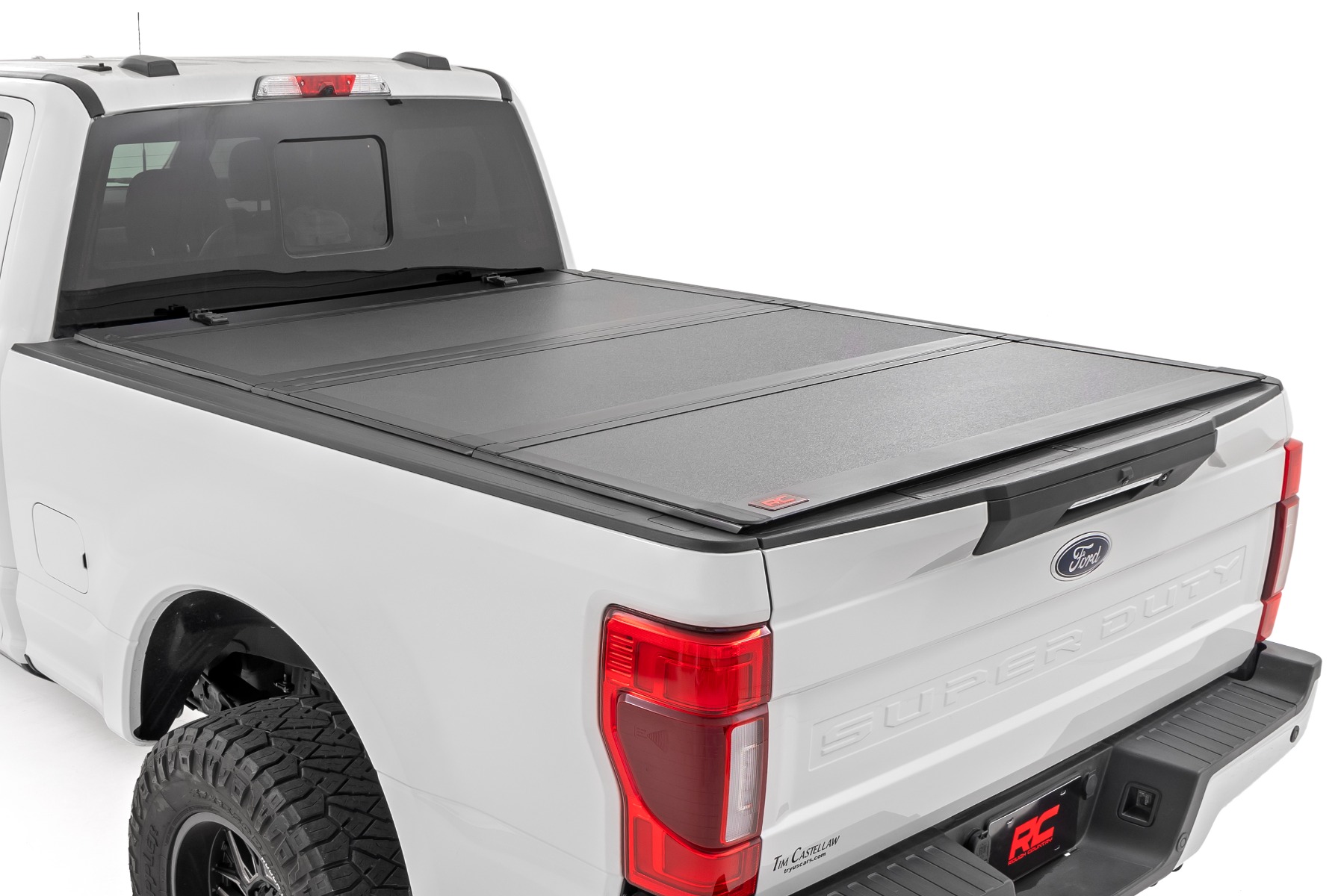 Rough Country Hard Tri-Fold Flip Up Bed Cover 6β10β Bed Ford F-250/F-350 Super Duty (17-26)