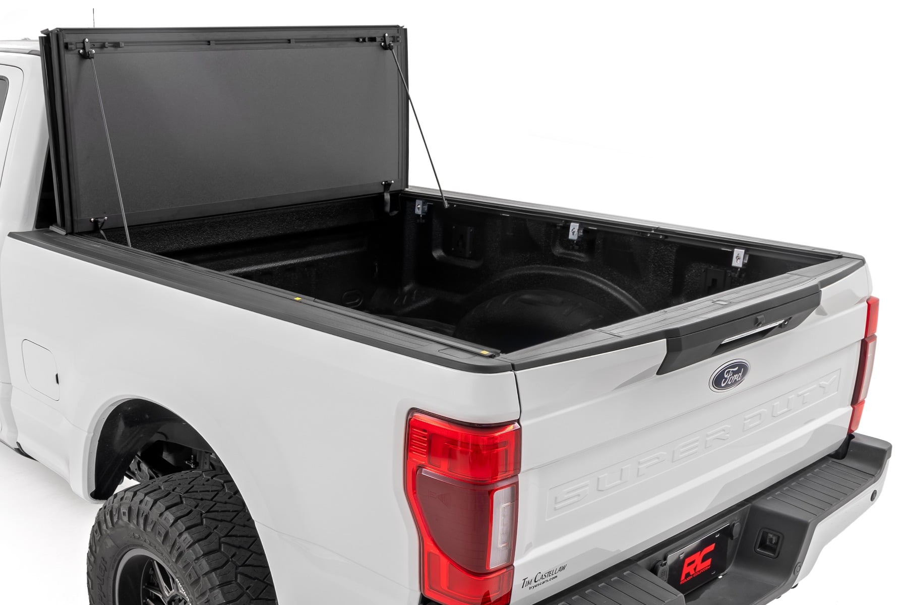 Rough Country Hard Tri-Fold Flip Up Bed Cover 6β10β Bed Ford F-250/F-350 Super Duty (17-26)