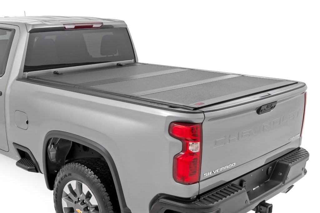 Rough Country Hard Tri-Fold Flip Up Bed Cover 6β9β³ Bed Chevy/GMC Silverado/Sierra 2500HD/3500HD (20-26)