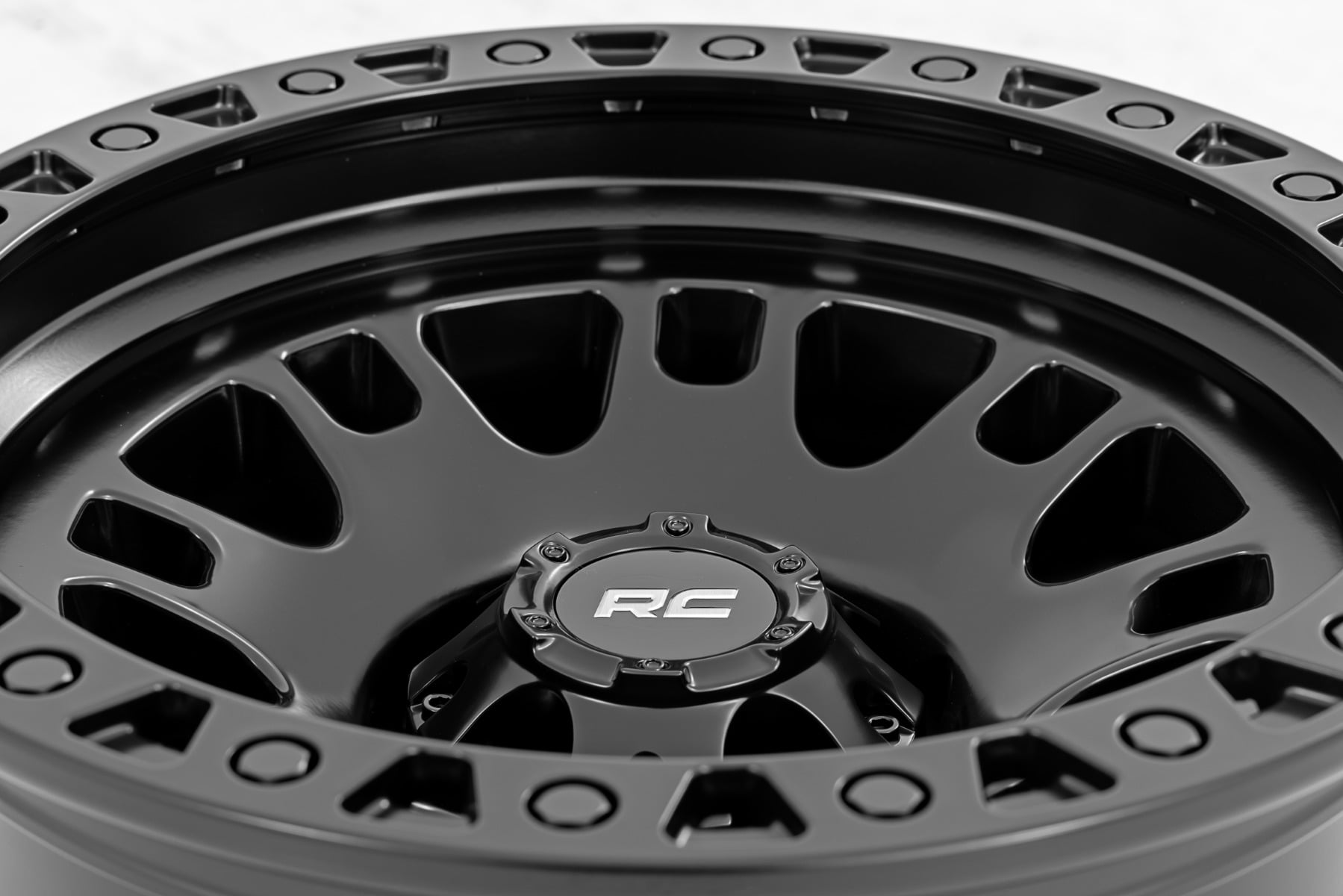 Rough Country 82 Series Wheel One-Piece Semi Gloss Black 15x8 5x5.5 -19mm