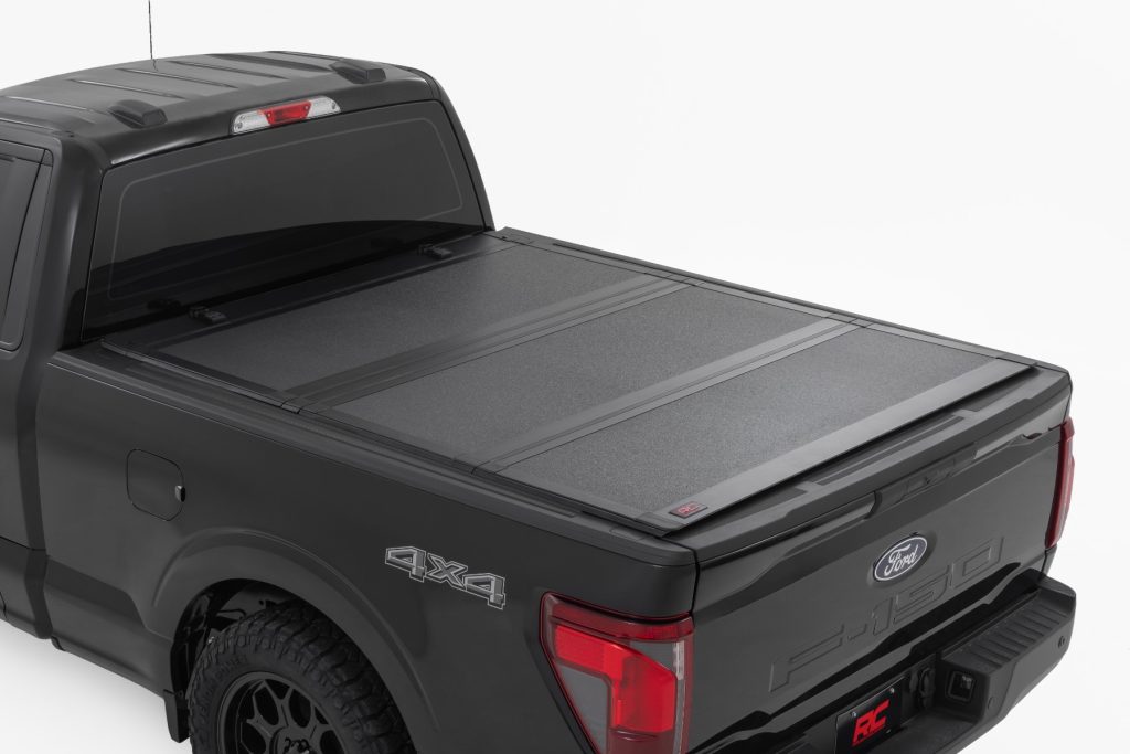Rough Country Hard Tri-Fold Flip Up Bed Cover 6’7″ Bed Ford F-150 2WD/4WD (2021-2026)