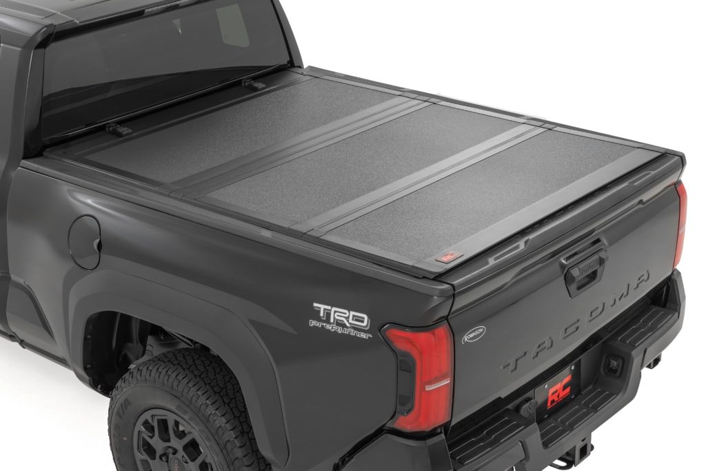 Rough Country Hard Tri-Fold Flip Up Bed Cover 6β² Bed Toyota Tacoma 2WD/4WD (2024-2026)