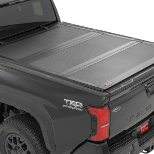 Rough Country Hard Tri-Fold Flip Up Bed Cover 6β² Bed Toyota Tacoma 2WD/4WD (2024-2026)