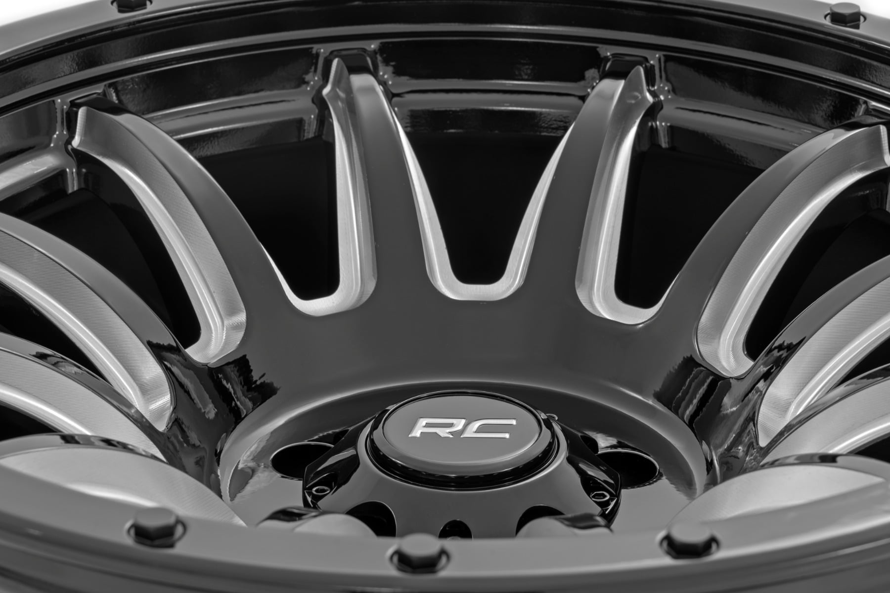 Rough Country 90 Series Wheel One-Piece Gloss Black w/machined spokes 20x9 6x5.5 -12mm